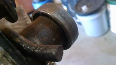 view of the inside of the idler bearing in place without the idler wheel.