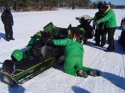 Checking out Jason's sled