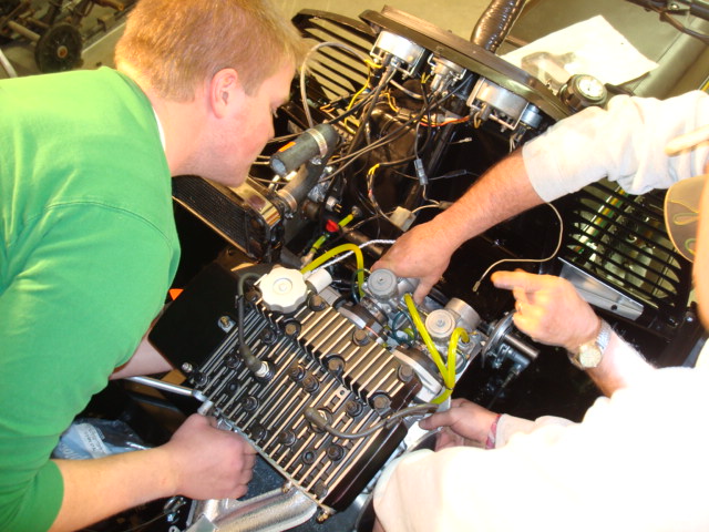 Nate, Bob and DA fitting the engine in the chassis.