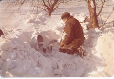 Dad digging out 1000 Gal. propane tank to check fill