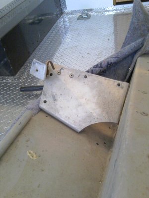 OEM left foot rest will be removed to accept modified one